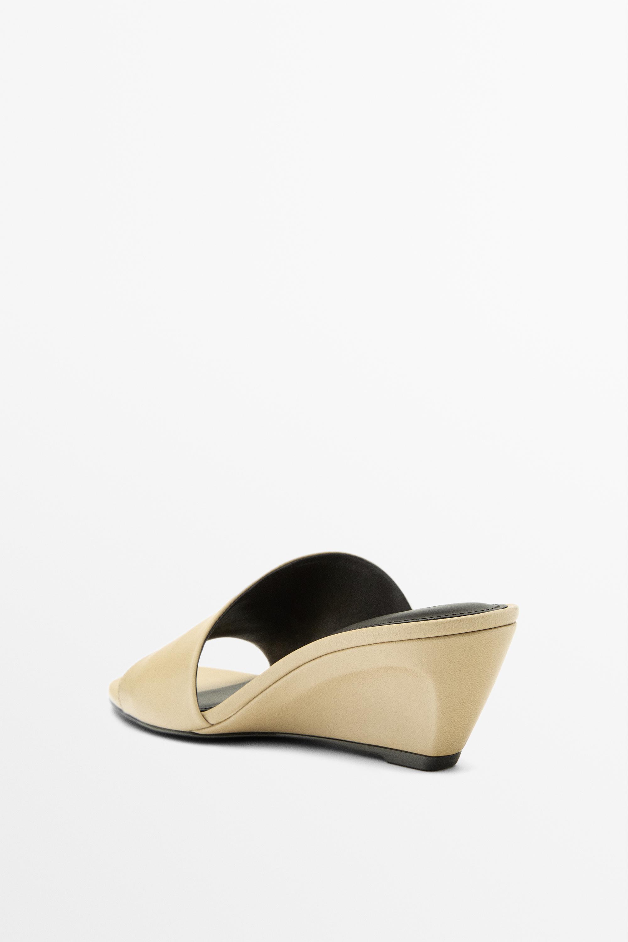 Sandale compensée en cuir souple